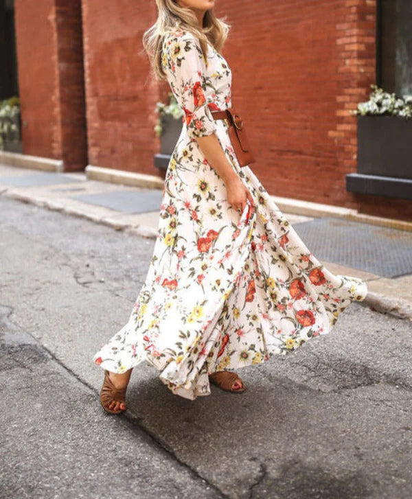 Abito estivo arioso da donna con gonna ampia e fiori | Maxi