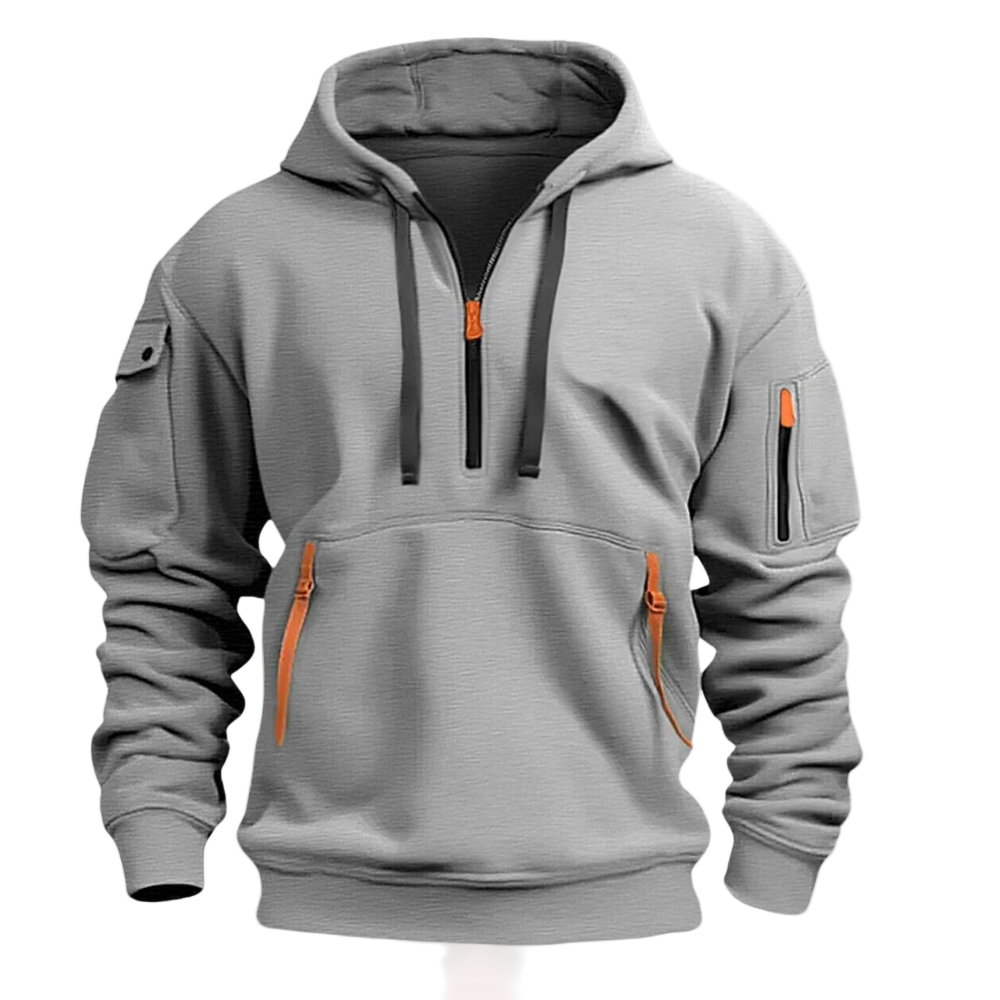 Grijze herenhoodie met oranje ritsen, zakken op mouw en buik, comfortabele pasvorm, casual streetwear, modieuze herenkleding.