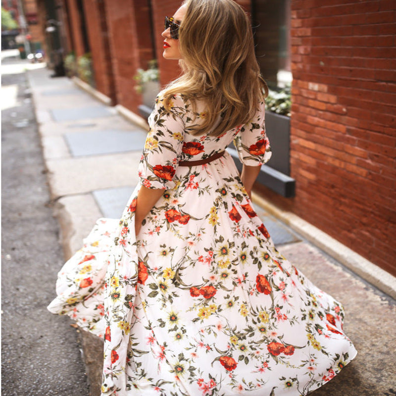 Abito estivo arioso da donna con gonna ampia e fiori | Maxi
