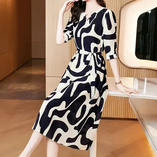 Dames Elegante jurk met abstracte print | Midi