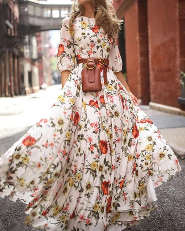 Abito estivo arioso da donna con gonna ampia e fiori | Maxi