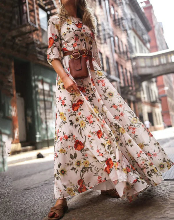 Abito estivo arioso da donna con gonna ampia e fiori | Maxi