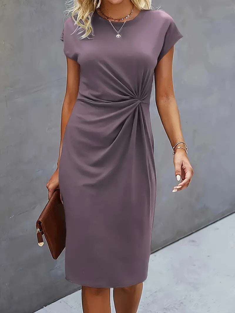 Abito estivo elegante da donna sagomato con twist | Midi